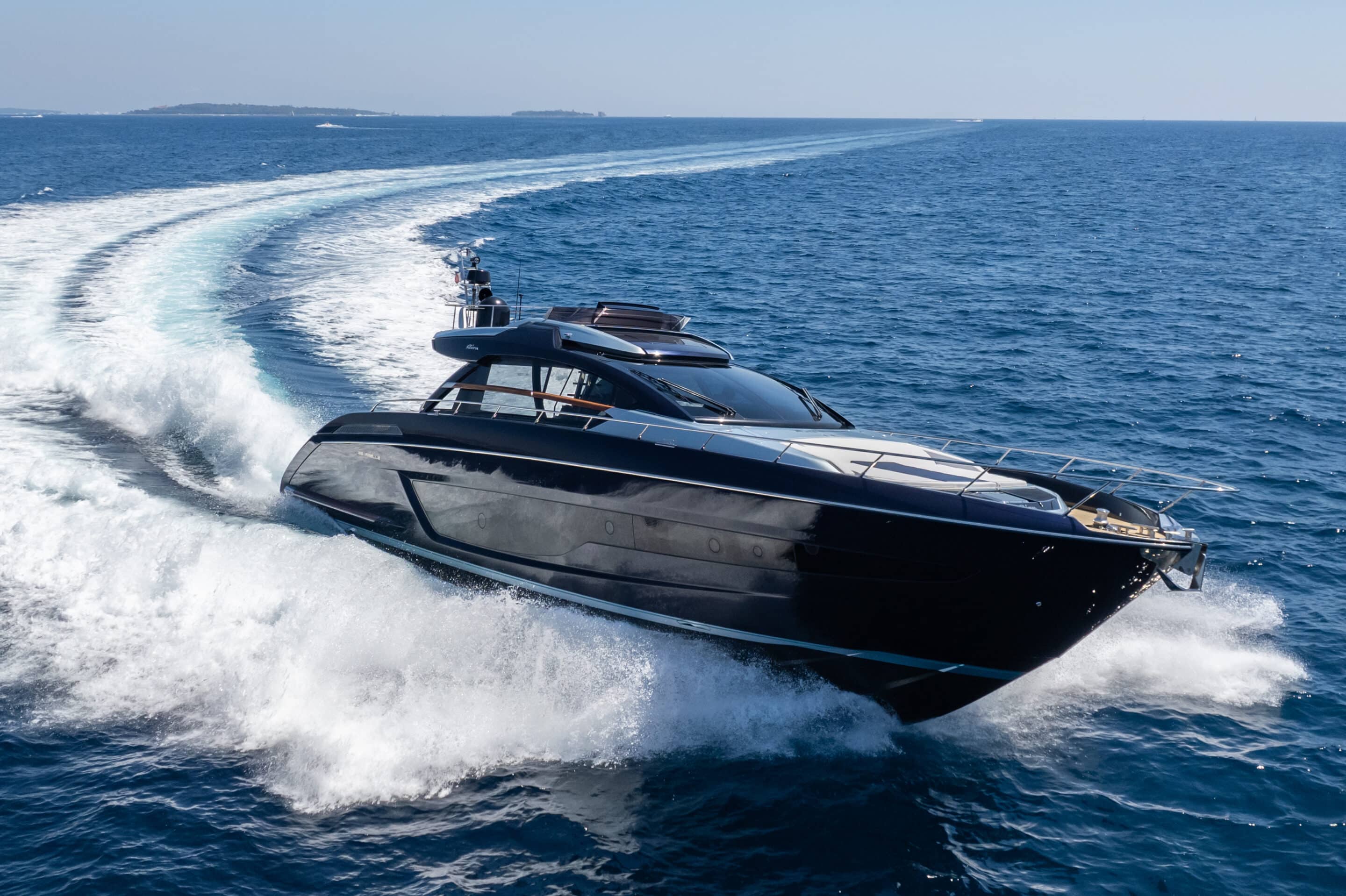 Motor yacht at speed leaving a wake