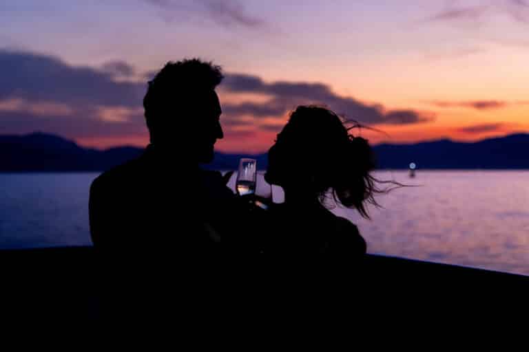 Couple on deck at sunset