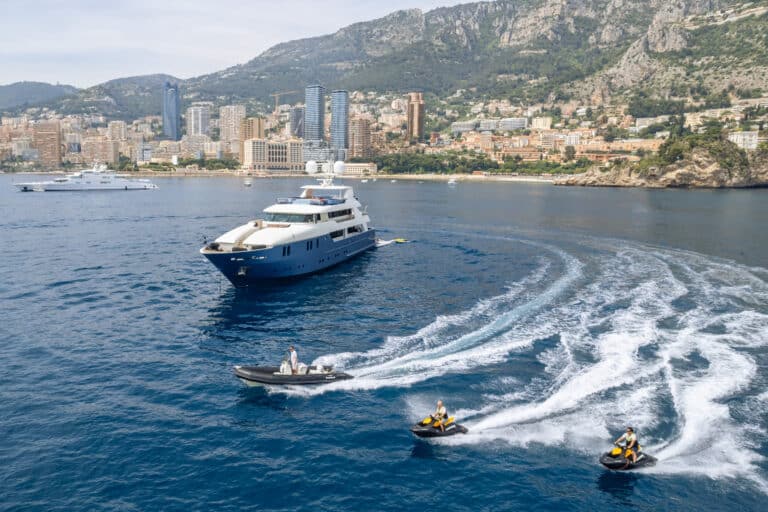 Yacht and jet skis off Monaco
