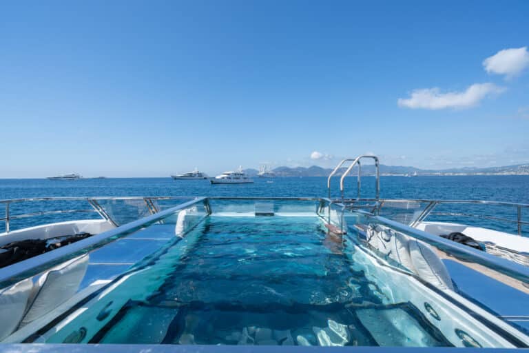 Glass-sided pool on a superyacht deck