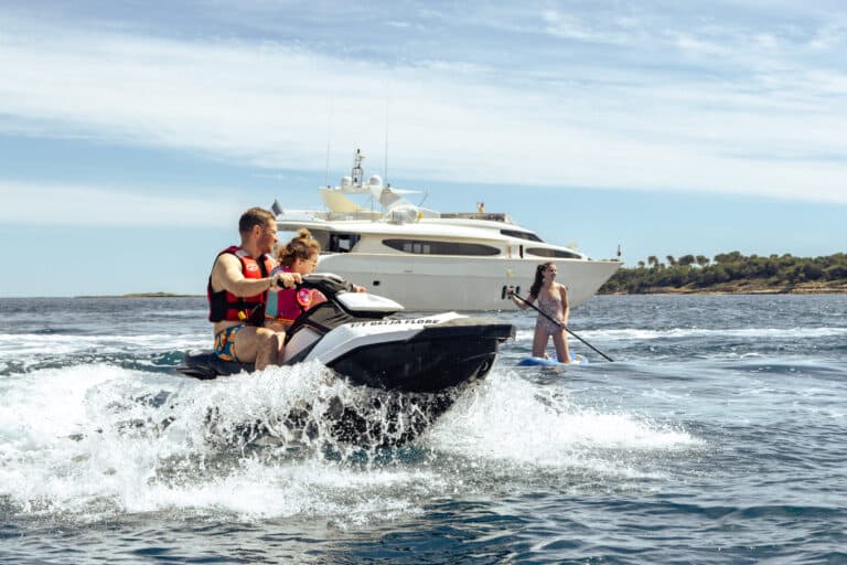 Two guests on a jet ski